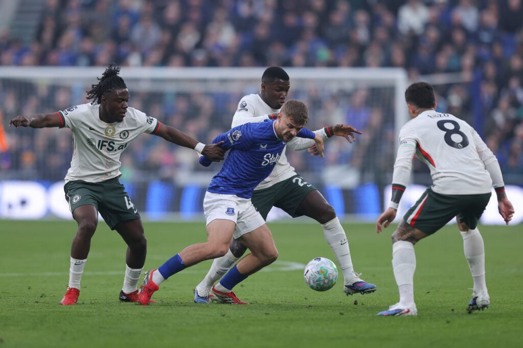 James Garner of Everton battles for possession with Moises Caicedo of Chelsea, Enzo Fernandez of Chelsea and Romeo Lavia of Chelsea