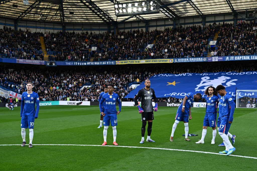 Chelsea players look on