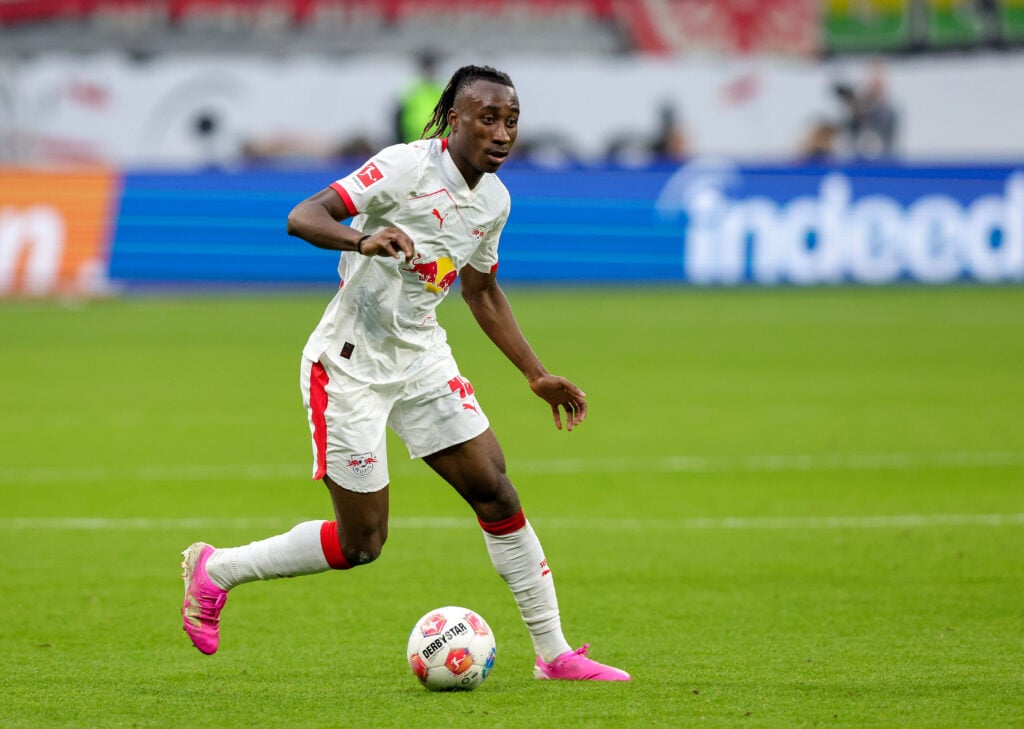 Yan Diomande of RB Leipzig plays the ball