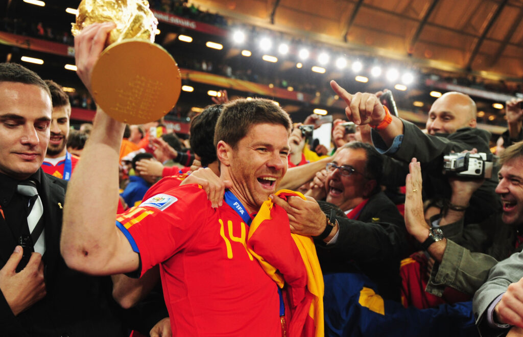 Xabi Alonso of Spain holds the World Cup