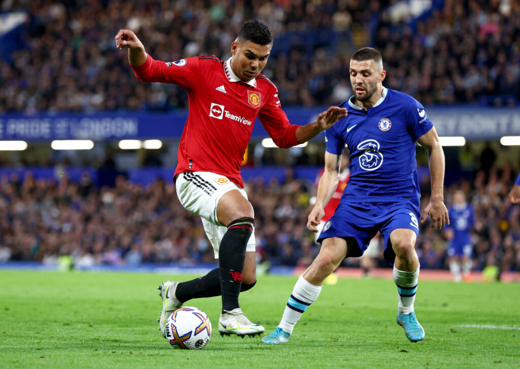 Casemiro of Manchester United battles for possession with Mateo Kovacic of Chelsea