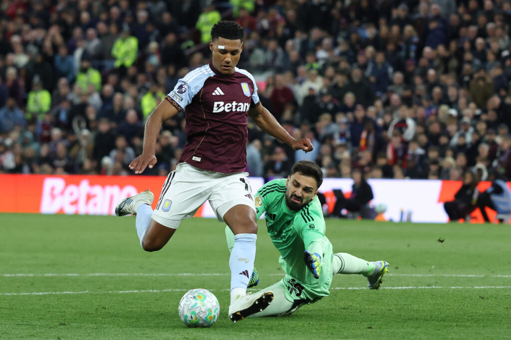 Aston Villa's English striker #11 Ollie Watkins puts the ball in the net
