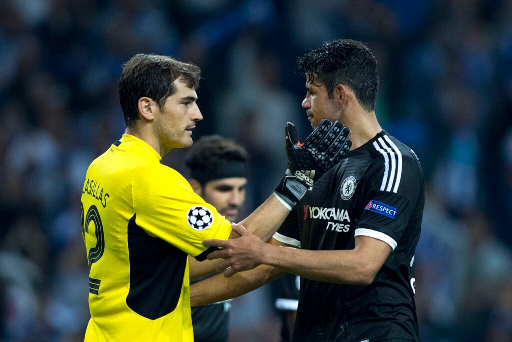 Iker Casillas (L) of FC Porto embraces Diego Costa (R) of Chelsea