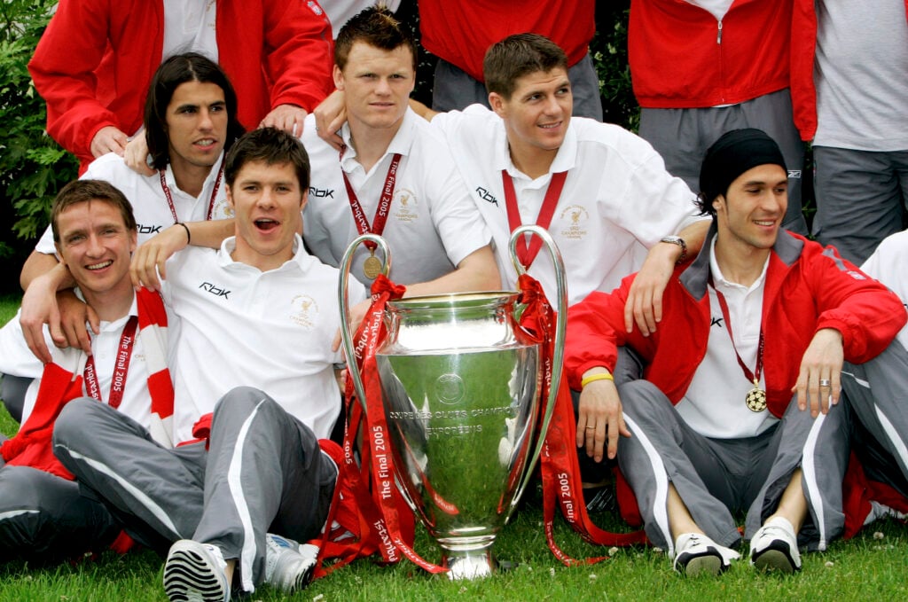 Liverpool players with Champions League trophy