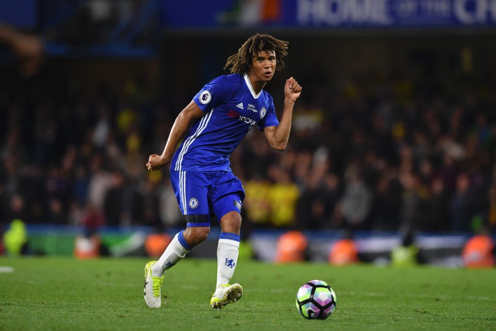 Chelsea's Dutch defender Nathan Ake plays the ball