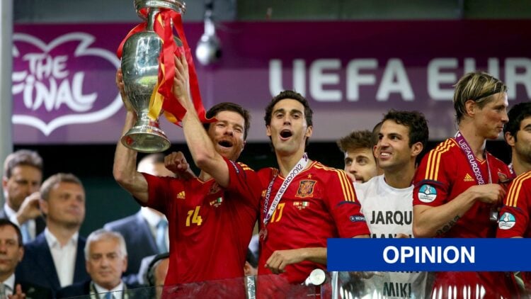Xabi Alonso of Spain holding trophy