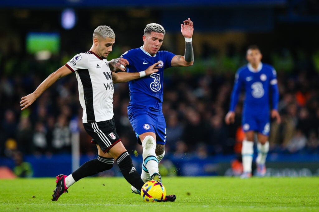 Enzo Fernandez of Chelsea vies for possession with Andreas Pereira of Fulham FC
