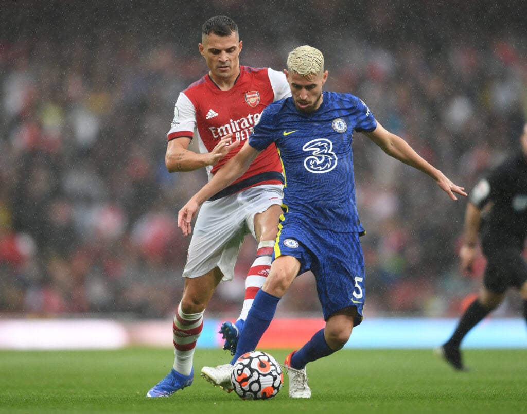 Granit Xhaka of Arsenal challenges Jorginho of Chelsea