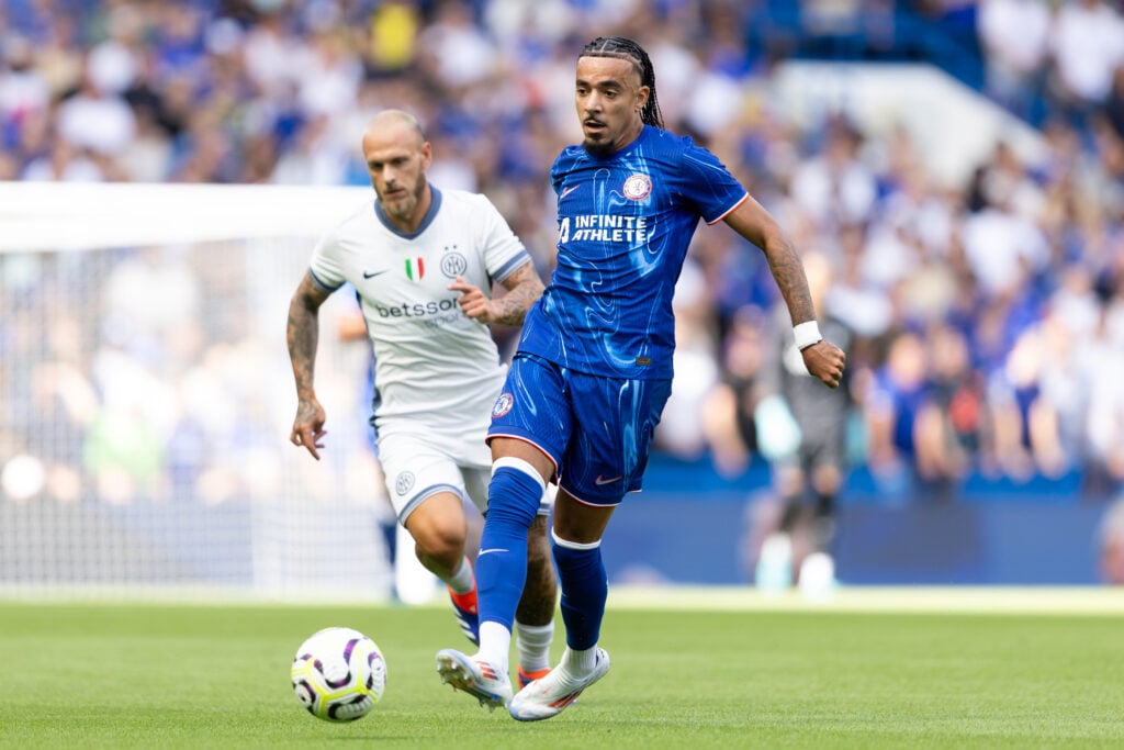 Malo Gusto of Chelsea passes the ball