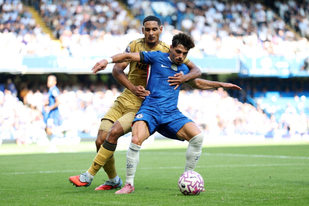 Pedro Neto of Chelsea is challenged by Maxence Lacroix of Crystal Palace