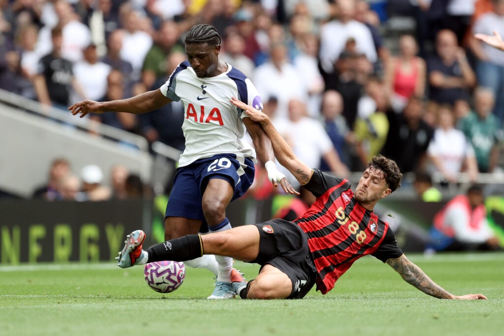 Mohammed Kudus of Tottenham Hotspur is tackled by Marcos Senesi of Bournemouth
