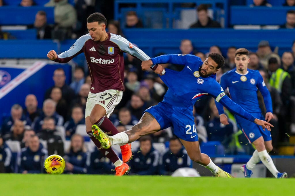 Morgan Rogers of Aston Villa and Reece James of Chelsea battle for the ball