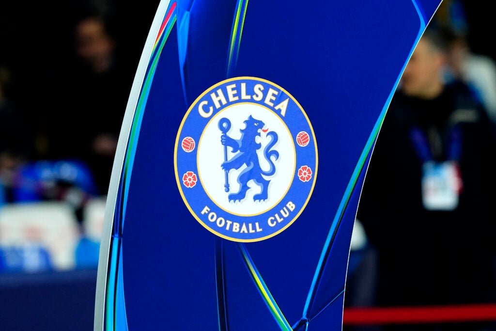 Chelsea badge on a UEFA-branded sign