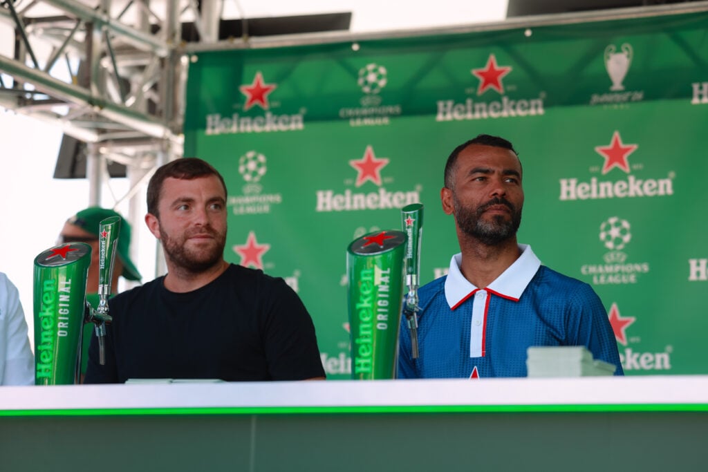 Former player Ashley Cole of England (R) and Fabrizio Romano