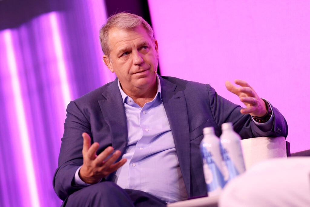 Todd Boehly speaks on stage