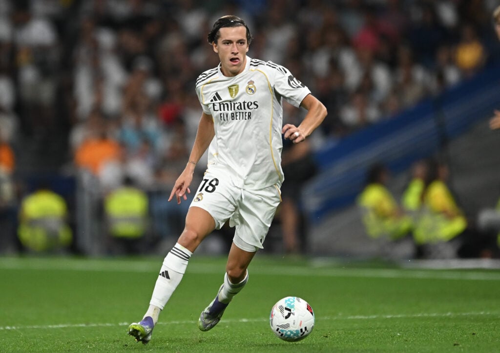 Alvaro Carreras of Real Madrid controls the ball