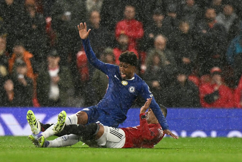 Manchester United's Brazilian midfielder #18 Casemiro fouls Chelsea's Brazilian midfielder #17 Andrey Santos