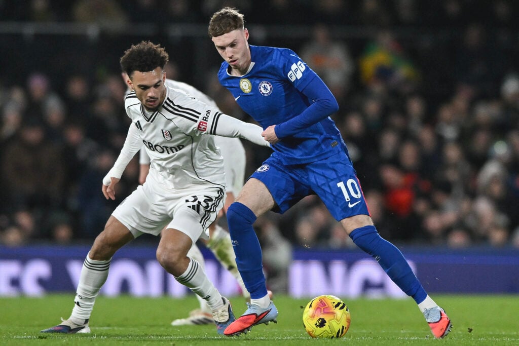 Cole Palmer of Chelsea and Antonee Robinson of Fulham