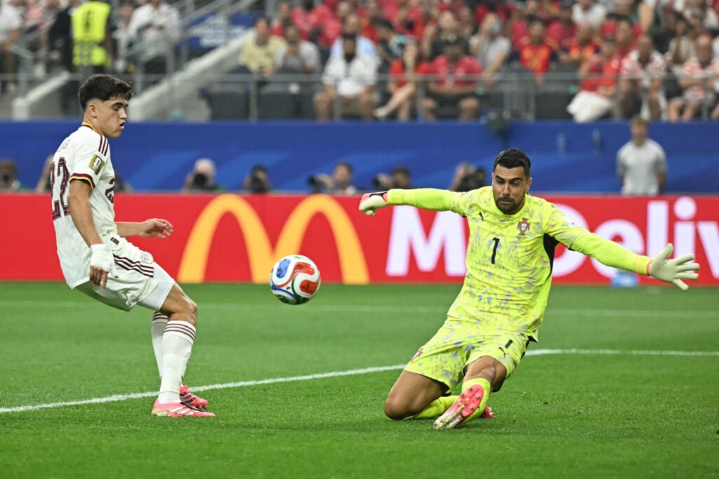 Spain's defender #22 Pau Cubarsi and Portugal's goalkeeper #01 Diogo Costa