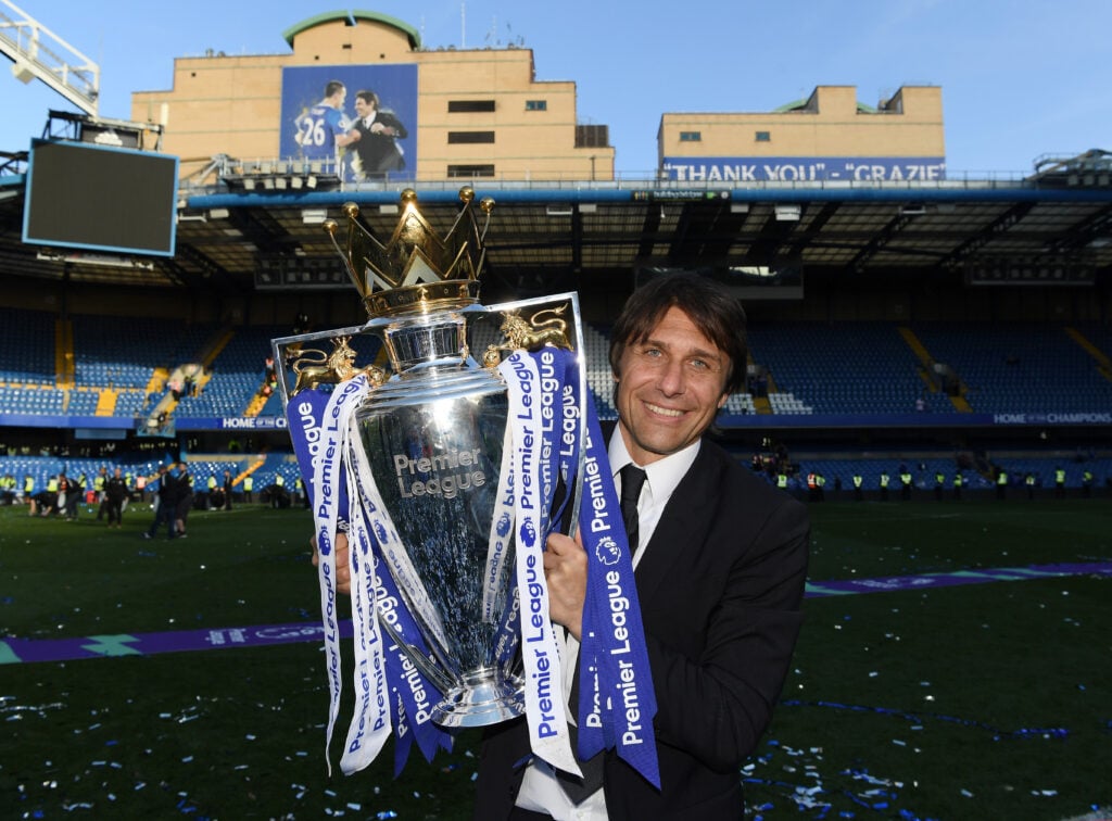 Antonio Conte, Manager of Chelsea poses with the Premier League Trophy