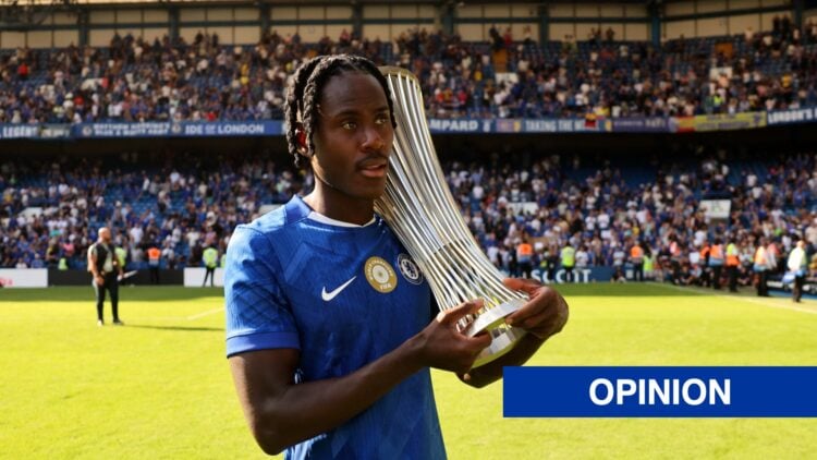 Trevoh Chalobah of Chelsea walks around with the UEFA Conference League trophy